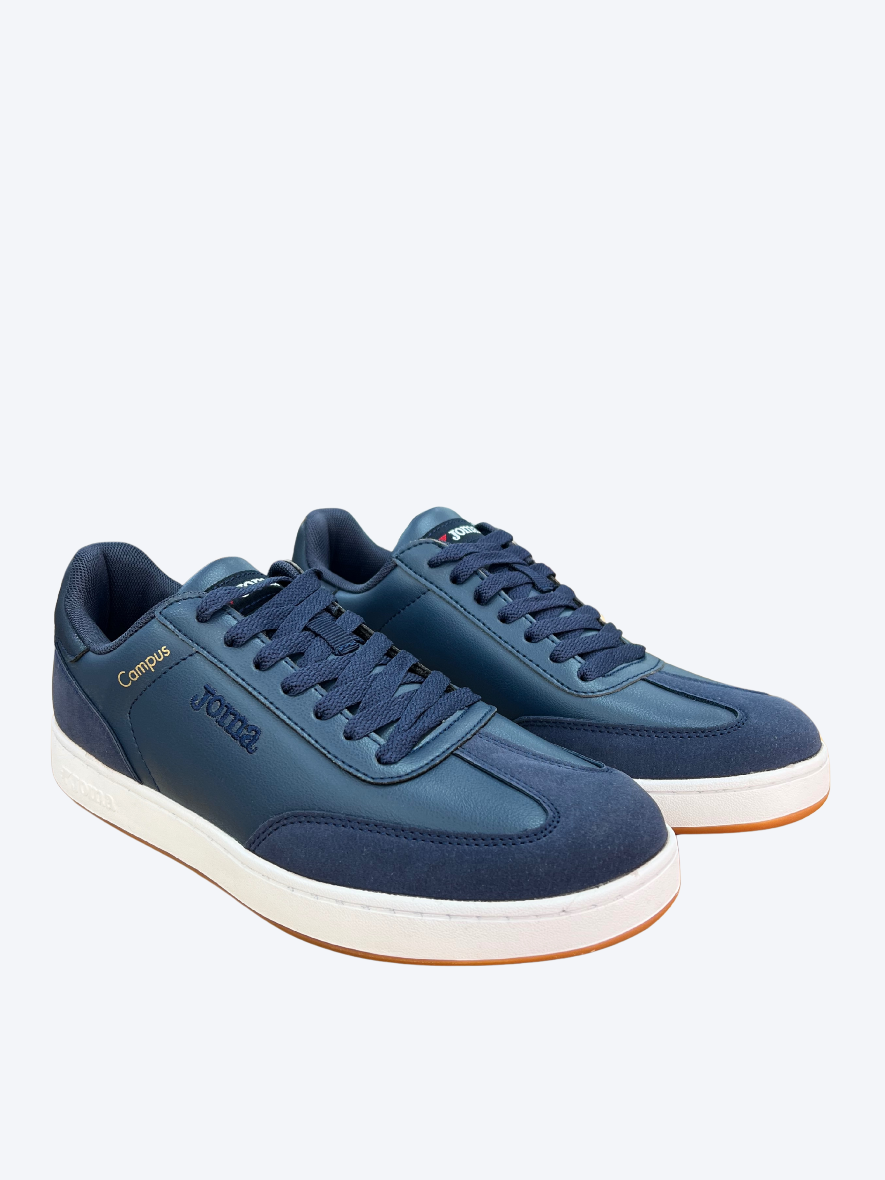 Par de zapatillas Joma Campus para hombre en color azul con diseño casual y suela blanca